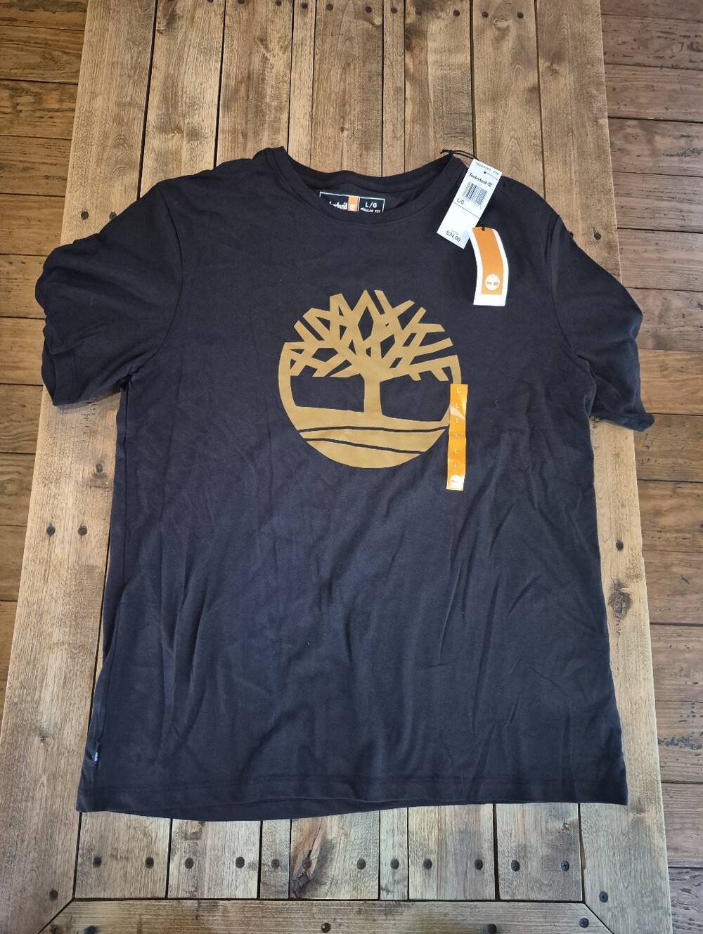 Timberland Men’s Black Short Sleeve Tee with Gold Tree Logo Size (Large)